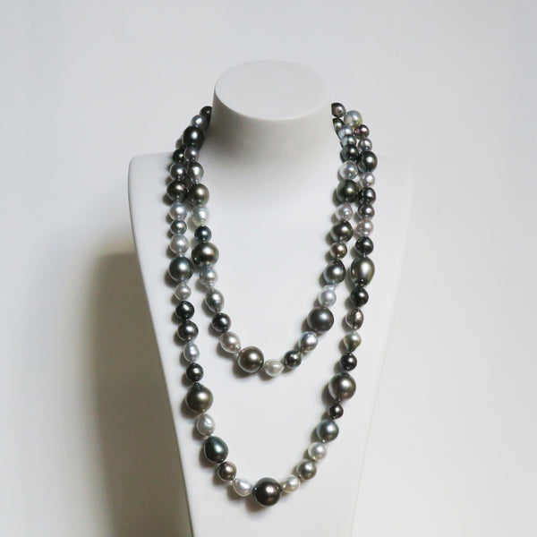 pearl strand silver grey black Tahitian south sea pearls. White background. 